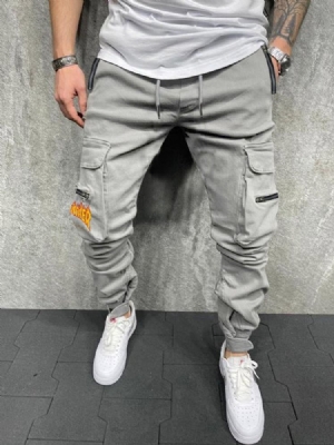 Pocket Plain Mid Waist Miesten Rento Kynähousut